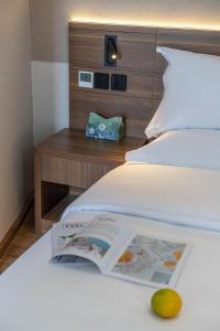 Postel nebo postele na pokoji v ubytování 山田心精品民宿 Valley Heart Inn