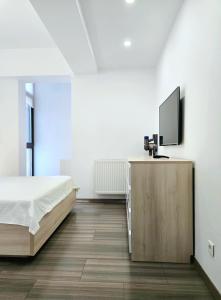 Ένα ή περισσότερα κρεβάτια σε δωμάτιο στο VR2 Central Apartment