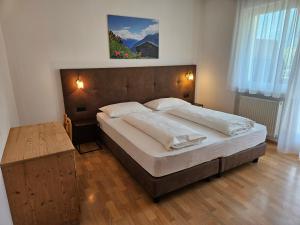 Postel nebo postele na pokoji v ubytování Residence Obstgarten