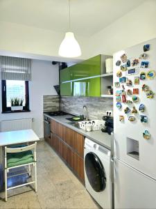 Η κουζίνα ή μικρή κουζίνα στο VR2 Central Apartment