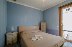 Кровать или кровати в номере Residence LA CANOVA