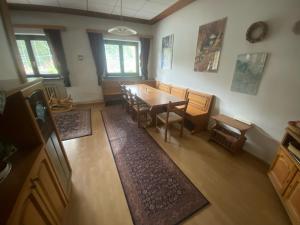 an overhead view of a dining room with a table and chairs at Dům U potoka in Rudník