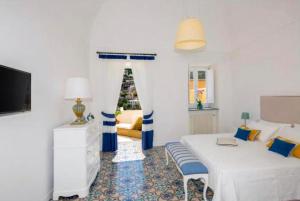 Postel nebo postele na pokoji v ubytování Hotel Punta Regina