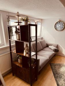 Posezení v ubytování Gemütliche Dachgeschosswohnung + 5 fotografií
