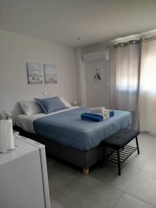 Postel nebo postele na pokoji v ubytování Aloha Inn