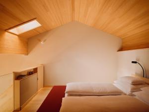 Posteľ alebo postele v izbe v ubytovaní Rote Wand Gourmet Hotel, a Member of Design Hotels