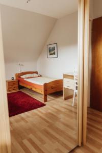 Ένα ή περισσότερα κρεβάτια σε δωμάτιο στο Privates Apartment im Grünen
