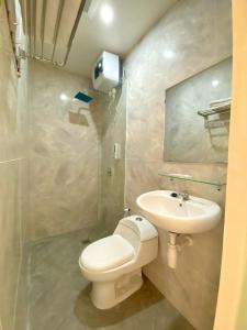 Koupelna v ubytování Al-Kiswah Syariah Guest House