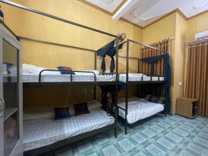 Ein Bett oder Betten in einem Zimmer der Unterkunft Loop Top Đồng Văn Homestay