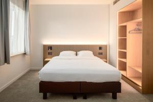 Hotel Chamade客房内的一张或多张床位