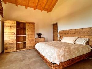 Ένα ή περισσότερα κρεβάτια σε δωμάτιο στο Agriturismo Ca' Ribelli