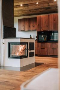 Kuchyň nebo kuchyňský kout v ubytování Almchalet - Luxus am Fuße der Koralpe + 17 fotografií