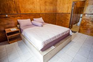 Rinjani Eco Villa Senaru客房内的一张或多张床位