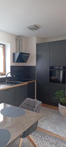 Kuchyňa alebo kuchynka v ubytovaní ArMand's Apartment in Leoben + 2 fotografie