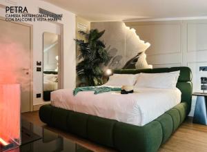 Postel nebo postele na pokoji v ubytování Amamare Luxury Room