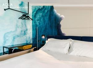 Postel nebo postele na pokoji v ubytování Amamare Luxury Room