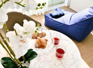 Posezení v ubytování Amamare Luxury Room