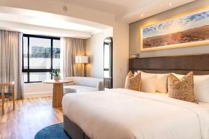 Кровать или кровати в номере President Hotel