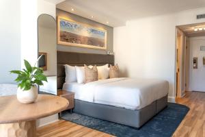 Кровать или кровати в номере President Hotel