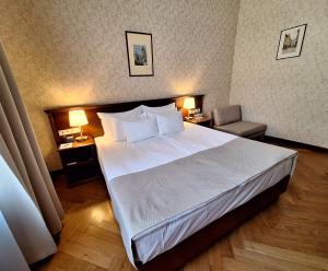 Postel nebo postele na pokoji v ubytování Hotel Rott