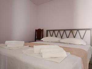 Postel nebo postele na pokoji v ubytování SELINA GUEST HOUSE