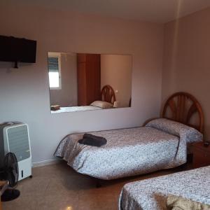 Postel nebo postele na pokoji v ubytování Casa Sol y montaña-habitaciones