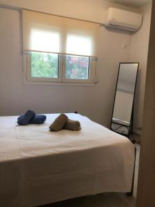 Ένα ή περισσότερα κρεβάτια σε δωμάτιο στο Joanna s apartment