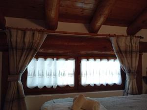 Posteľ alebo postele v izbe v ubytovaní Appartamento incantevole con vista sulla vallata