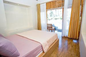 Rinjani Eco Villa Senaru客房内的一张或多张床位