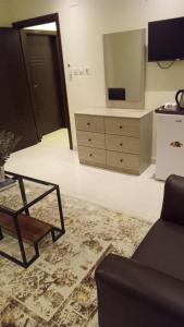 TV a/nebo společenská místnost v ubytování Al tawfeeg hotel - Al Azizyah
