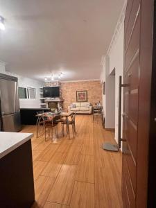 A kitchen or kitchenette at KONTIS' Luxury Detached house near the sea