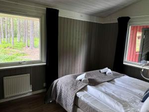 Postel nebo postele na pokoji v ubytování Semester i Lindvallen med det extra
