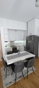 Kuchyň nebo kuchyňský kout v ubytování apartman Elena