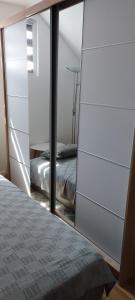 Postel nebo postele na pokoji v ubytování apartman Elena