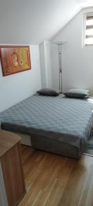 Postel nebo postele na pokoji v ubytování apartman Elena