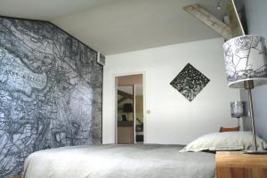 En eller flere senge i et værelse på QV51 Epernay