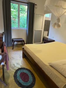 Postel nebo postele na pokoji v ubytování Holiday Inn Unawatuna