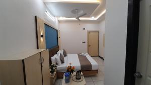 Voodi või voodid majutusasutuse Hotel Sun Palace toas