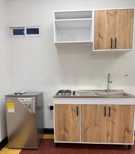 Kuchyň nebo kuchyňský kout v ubytování HOSTAL CASA PALMA