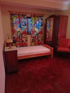 Ένα ή περισσότερα κρεβάτια σε δωμάτιο στο t3 vista de mar a 100 m praia +6 φωτογραφίες