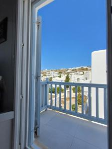 Un balcón o terraza en Manos Rooms