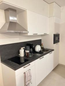 Kuchyň nebo kuchyňský kout v ubytování Hote Brussels center City luxe Tours et Taxi
