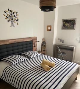 En eller flere senge i et værelse på Kerbiquette