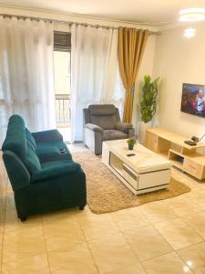 Φωτογραφία από το άλμπουμ του Cozy Residence III 2bedroom Apartment near Speke Resort στην Καμπάλα