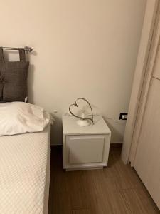 Postel nebo postele na pokoji v ubytování Ema Home