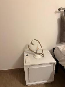 Postel nebo postele na pokoji v ubytování Ema Home