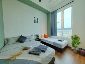 Postel nebo postele na pokoji v ubytování Ipoh D Festivo Suites 6-10pax 10mins to Sunway Tambun by IWH