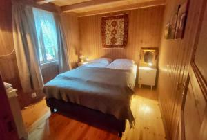Postel nebo postele na pokoji v ubytování Cabin with charm in Lofoten