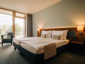 Voodi või voodid majutusasutuse Deltapark Vitalresort**** toas