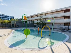 a pool in a building with a water park at Alua Atlantico Golf - All Inclusive in San Miguel de Abona